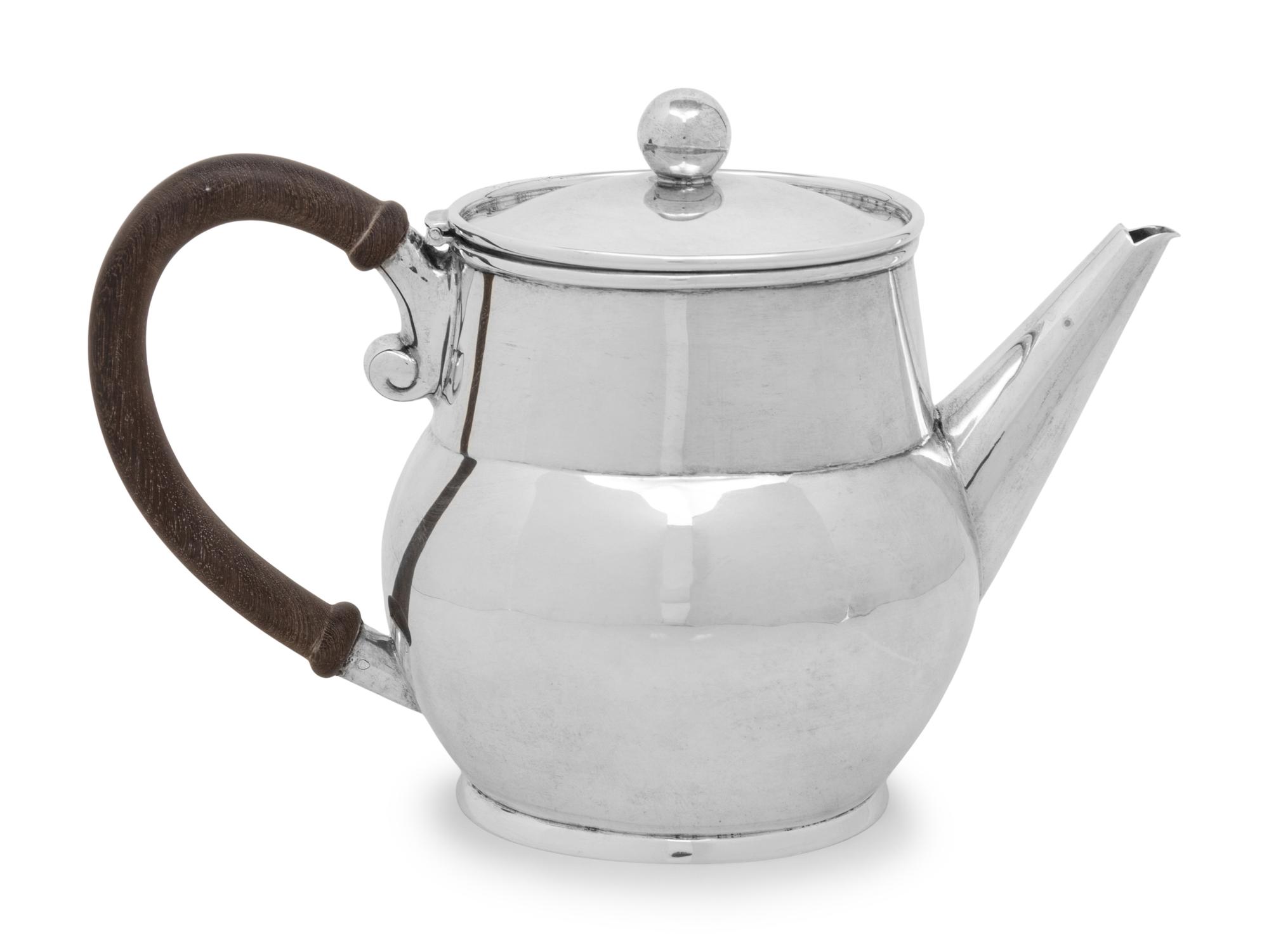 A Mexican Silver Teapot