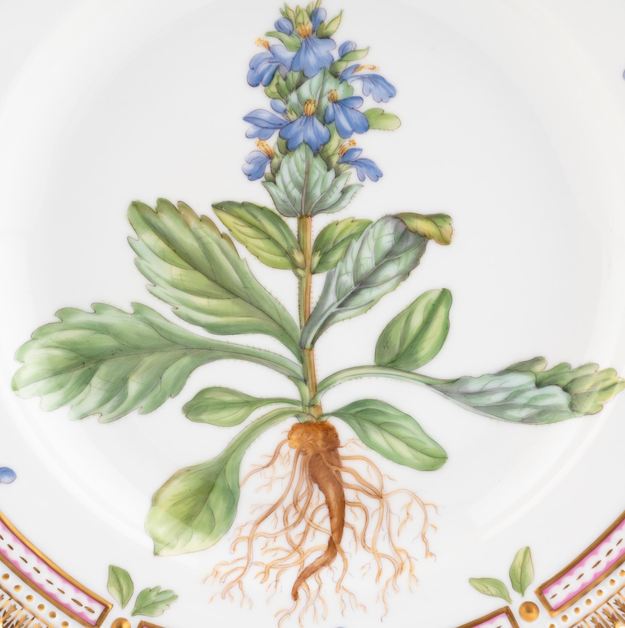 A Set of Eight Royal Copenhagen Flora Danica Porcelain Dinner Plates