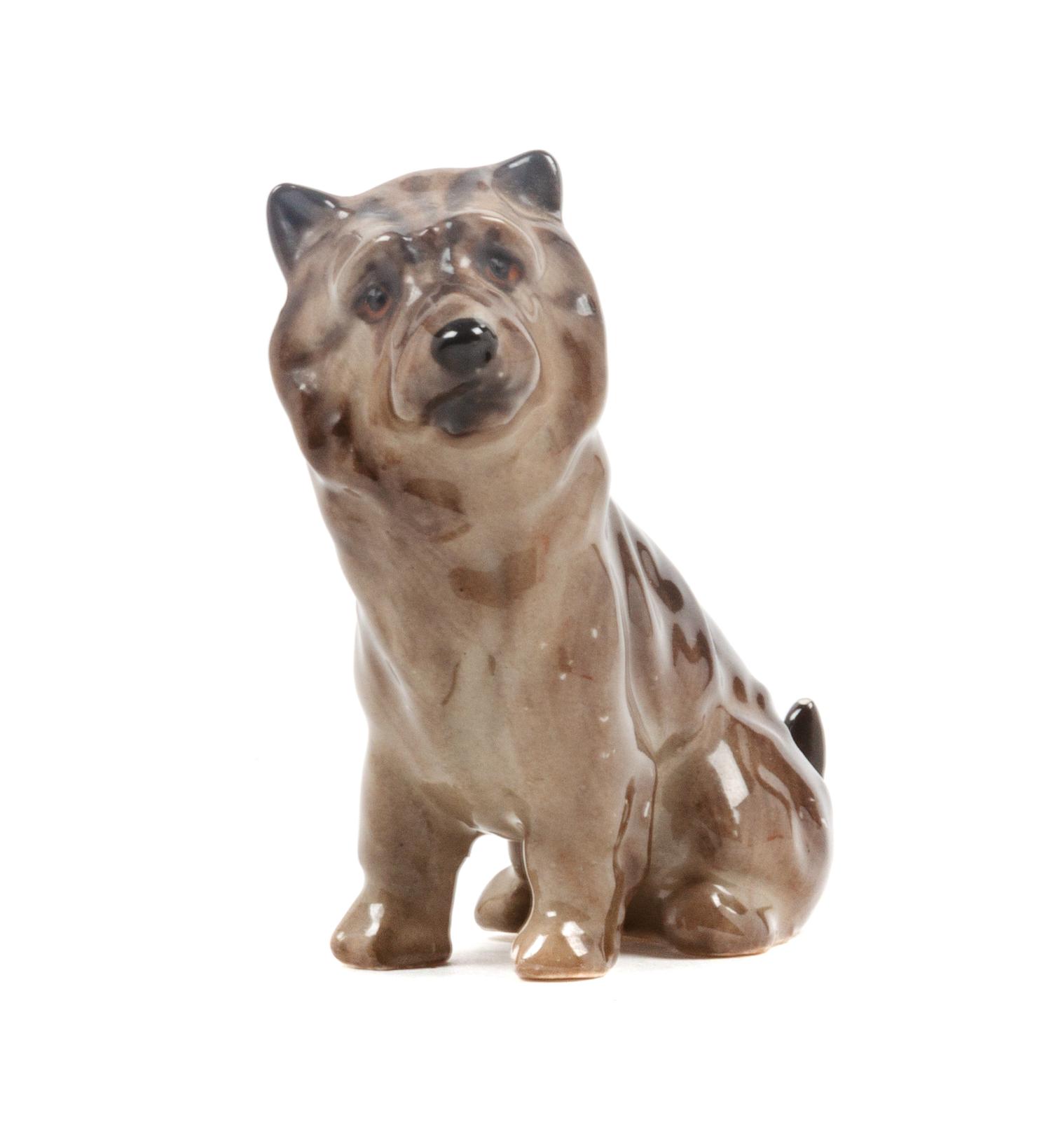 A Royal Doulton Porcelain Cairn Terrier Height 2 1/2 inches.