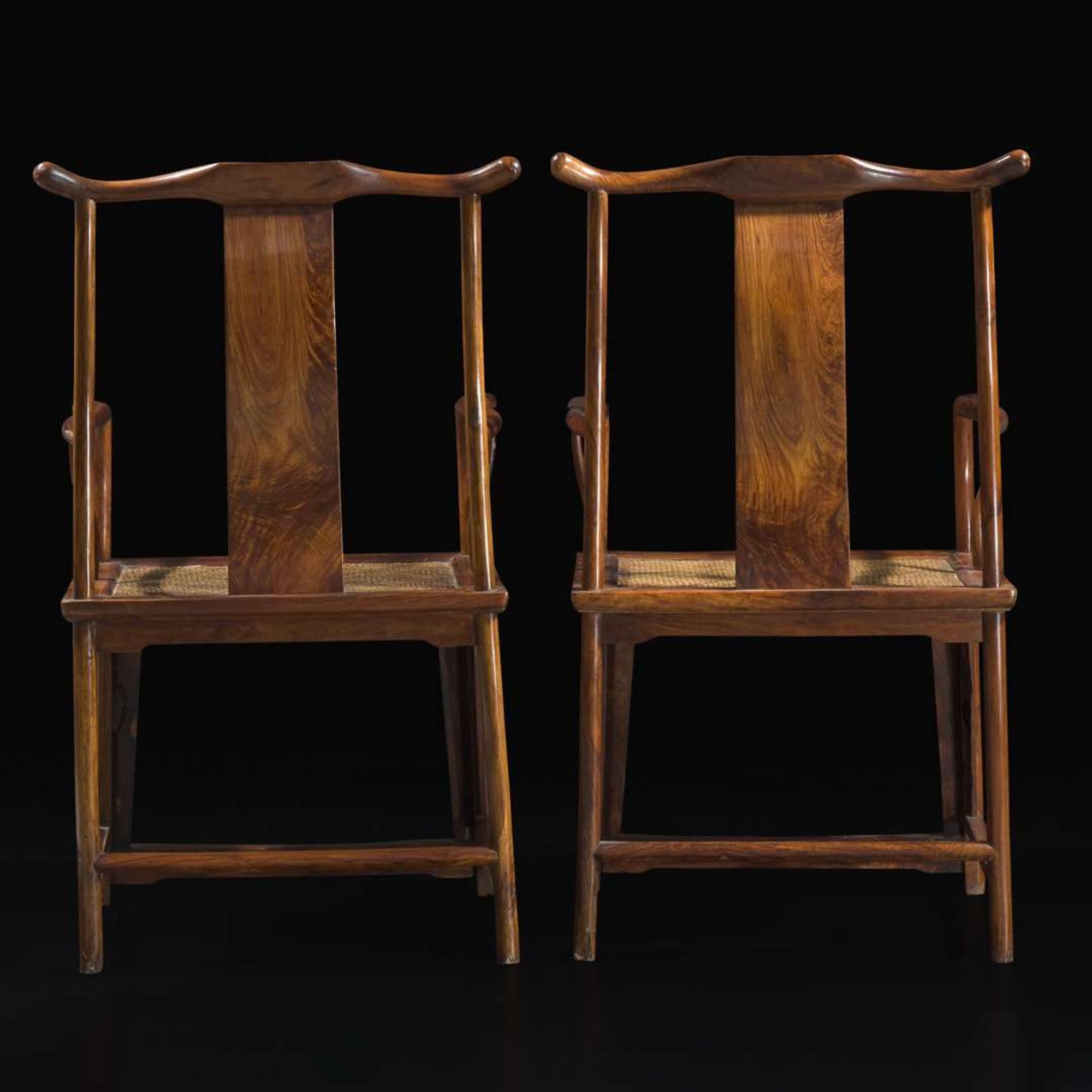 A rare pair of Chinese Huanghuali yoke-back armchairs, sichutou guanmaoyi 黄花梨四出頭官帽椅一对 17th/ 18th century ???????