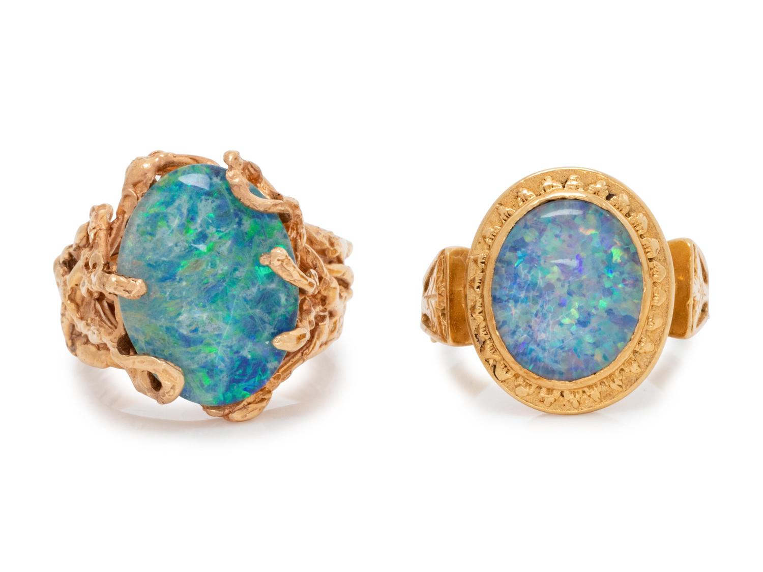 A Collection of 14 Karat Yellow Gold and Opal Doublet Rings,