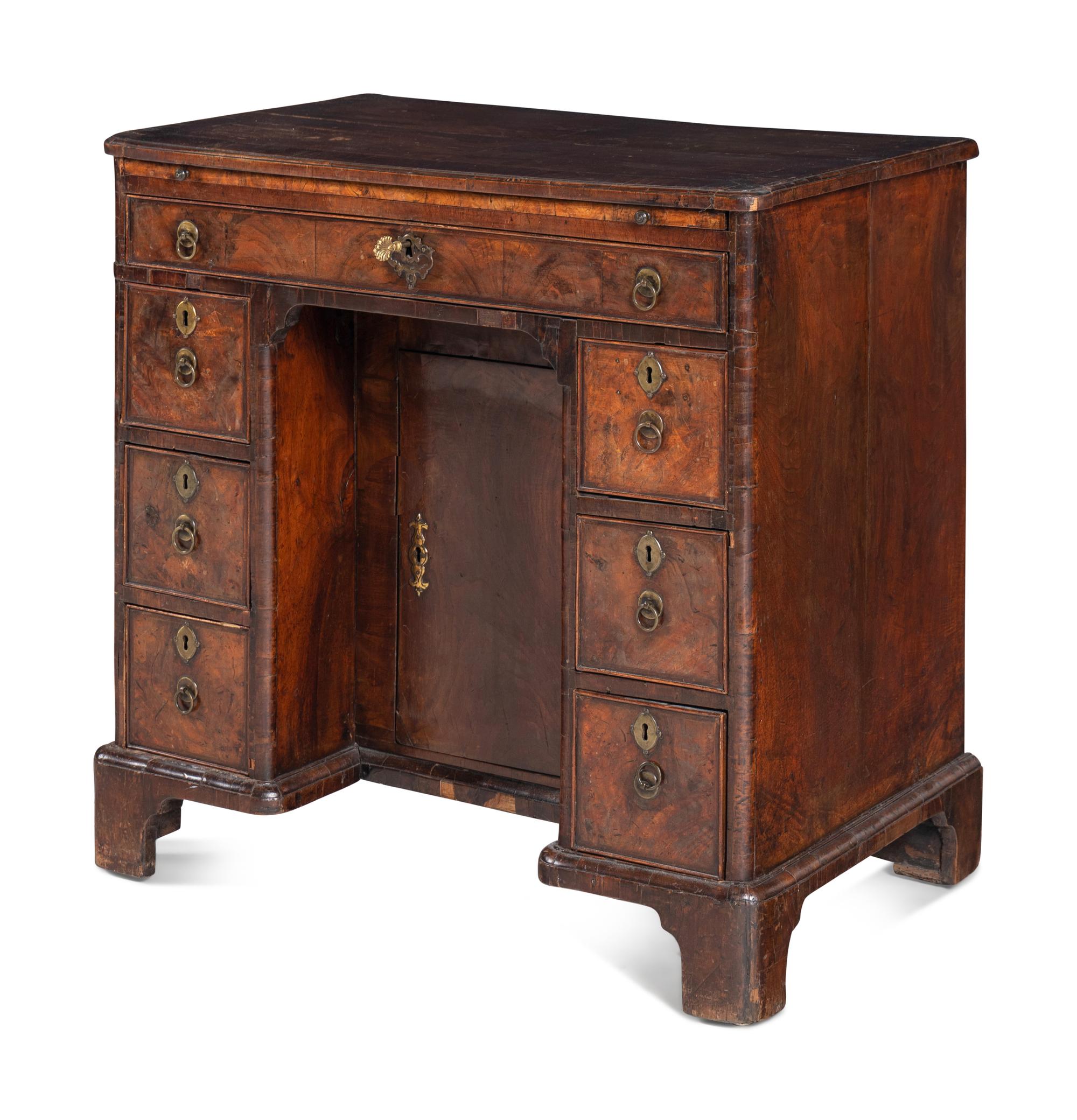 A George II Walnut Kneehole Desk