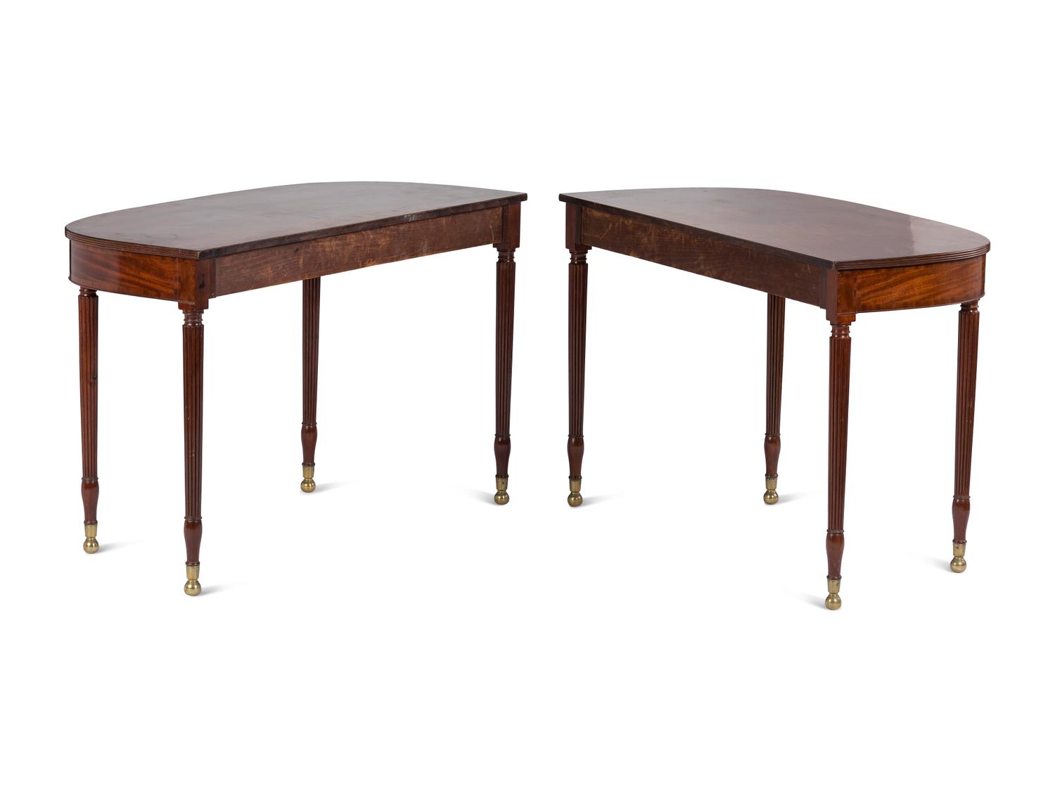 A Pair of Federal Brass-Mounted, Carved and Crossbanded Mahogany Console Tables