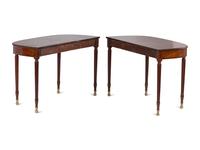 A Pair of Federal Brass-Mounted, Carved and Crossbanded Mahogany Console Tables