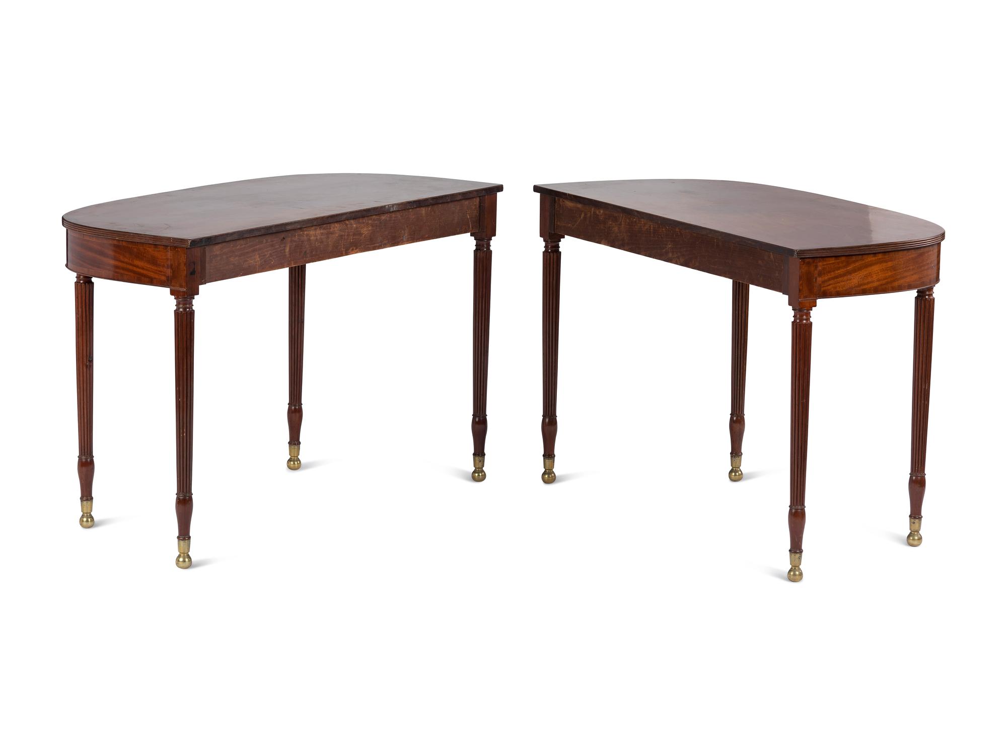 A Pair of Federal Brass-Mounted, Carved and Crossbanded Mahogany Console Tables