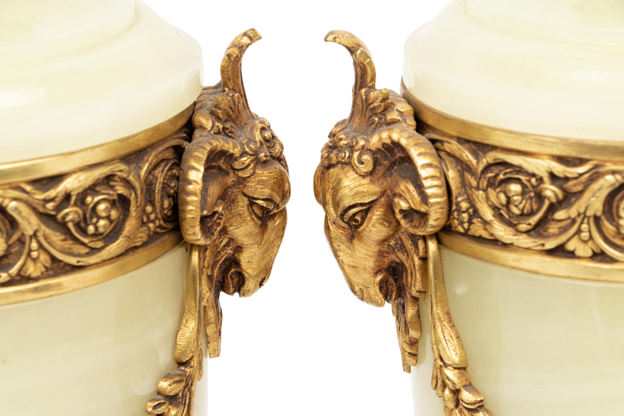 A Pair of Continental Gilt Metal Mounted Onyx Urns Mounted as Lamps