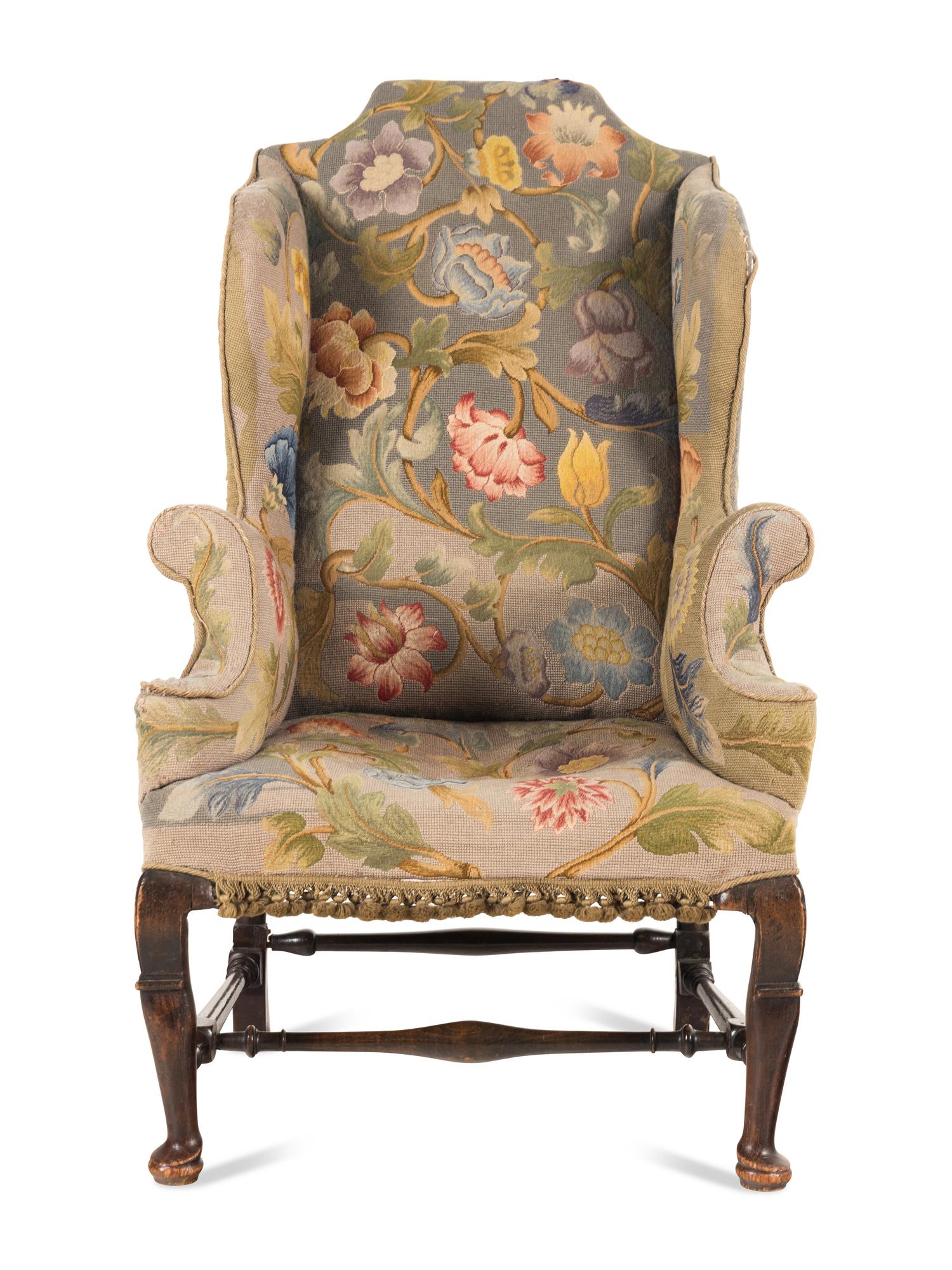 A Queen Anne Beechwood and Pine Wingback Armchair