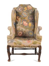 A Queen Anne Beechwood and Pine Wingback Armchair