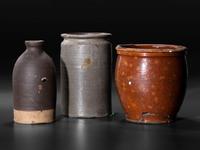 Sixteen Stoneware Vessels