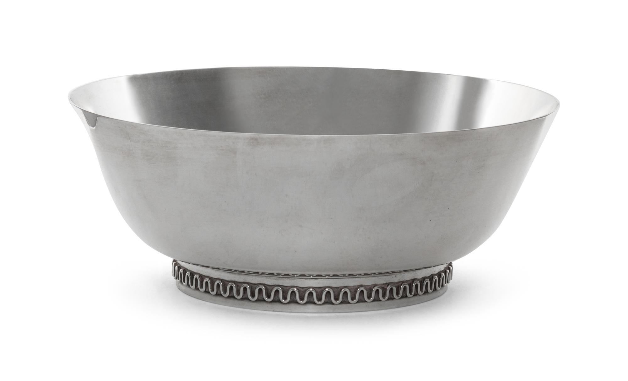 A Danish Silver Bowl, Sigvard Bernadotte for Georg Jensen, Copenhagen, with shallow tapered sides and a circular foot ring having an ap