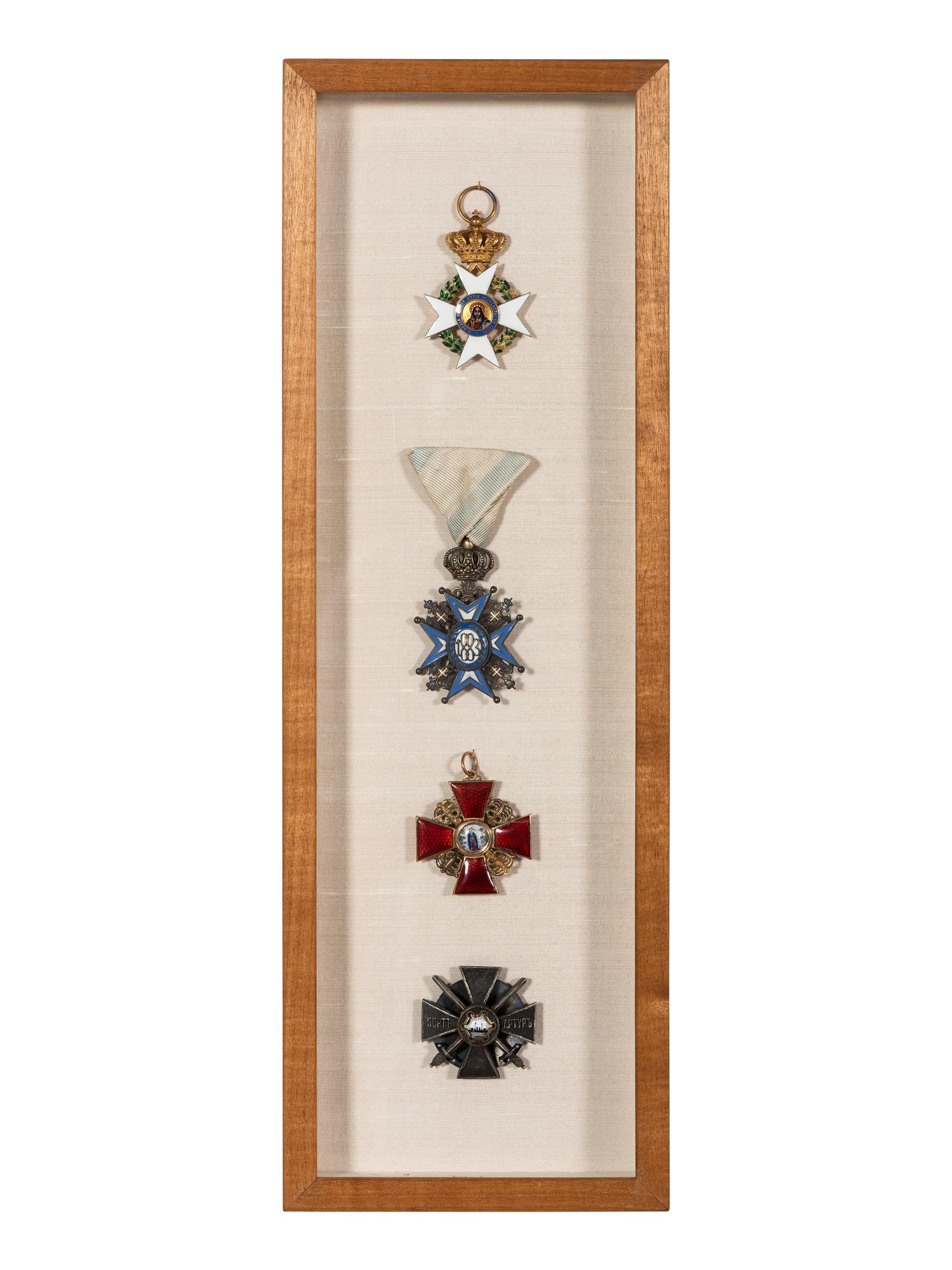 Four Eastern European Order of Merit Badges