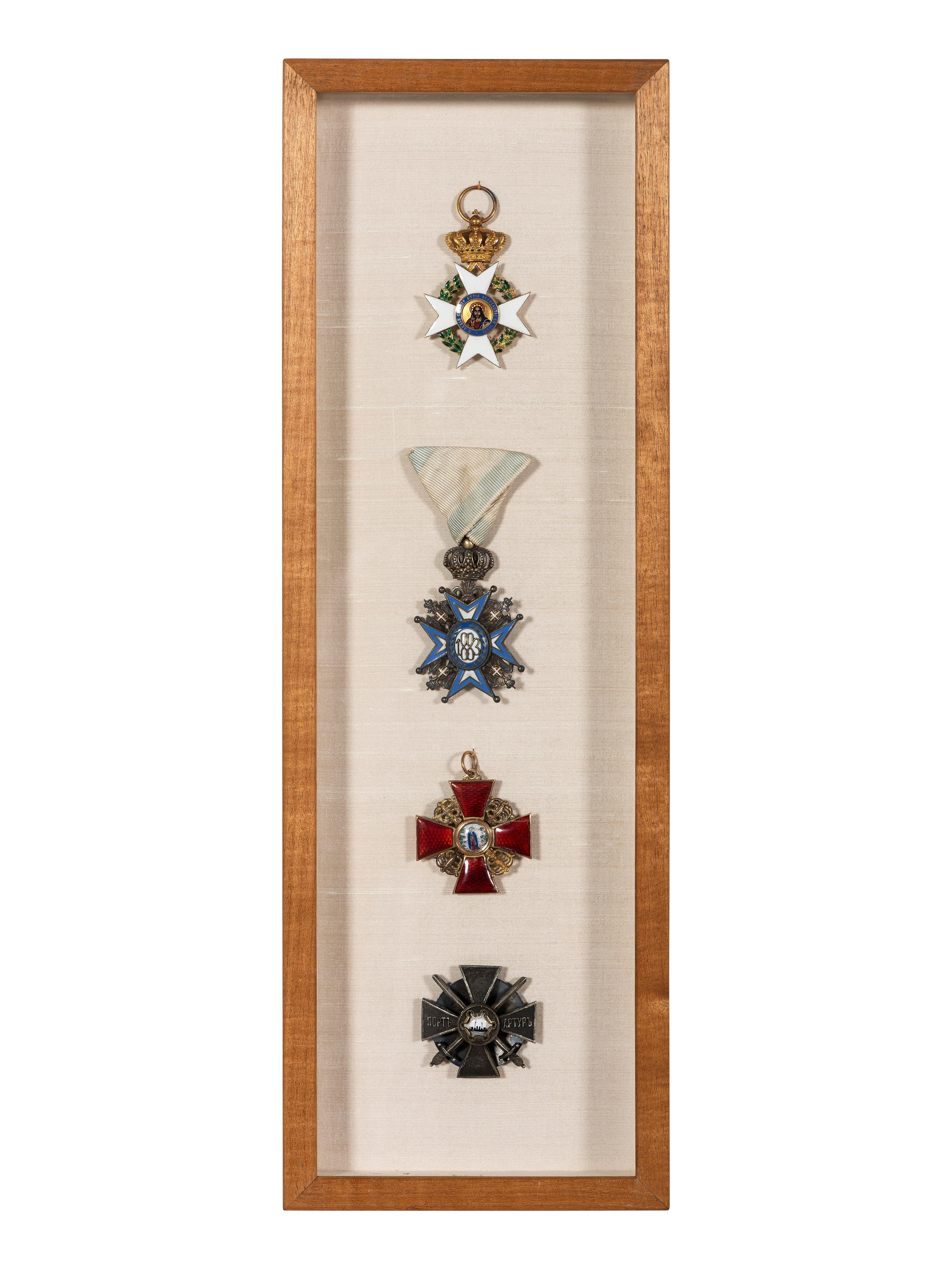 Four Eastern European Order of Merit Badges