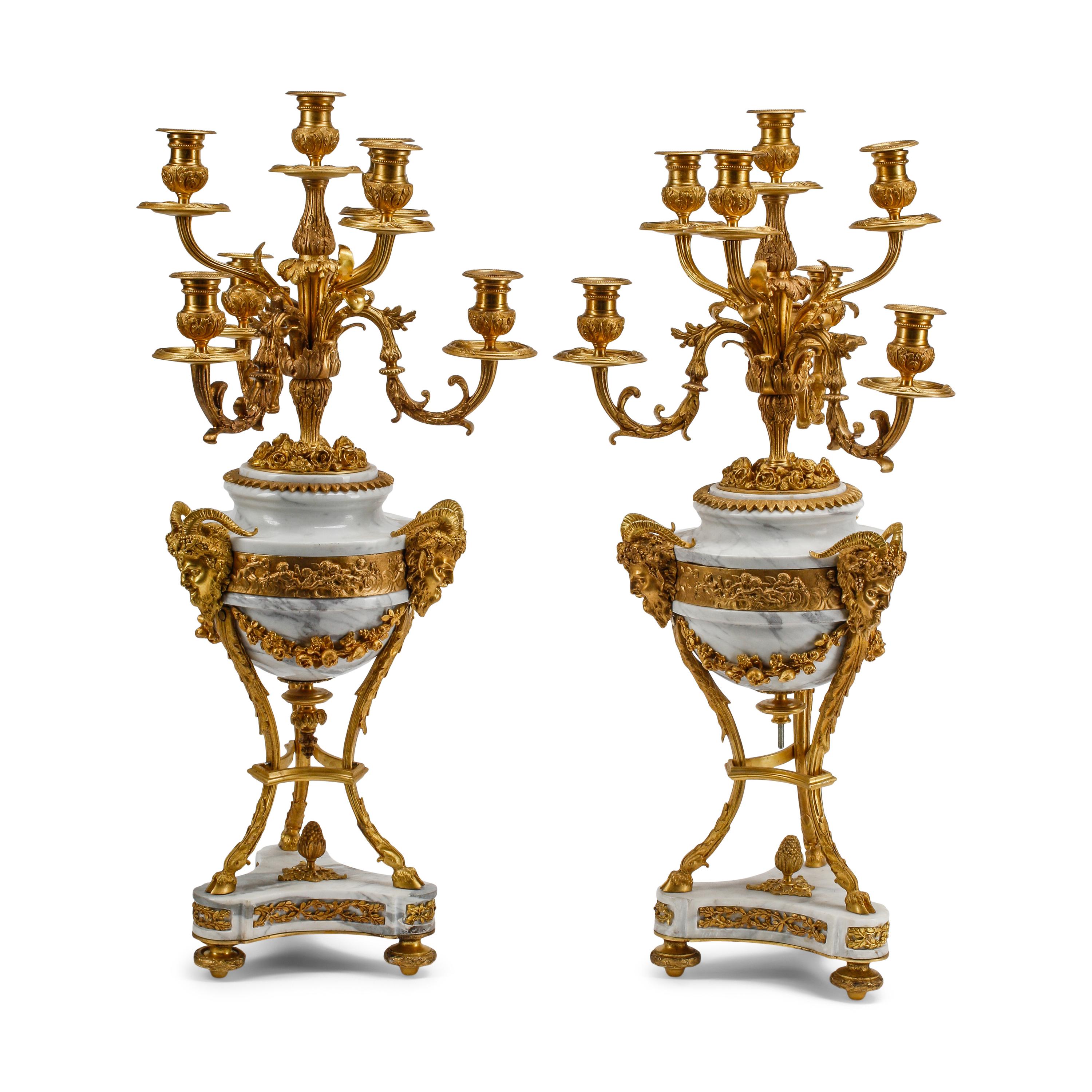A Pair of Louis XV Style Gilt Bronze and Marble Seven-Light Candelabra
