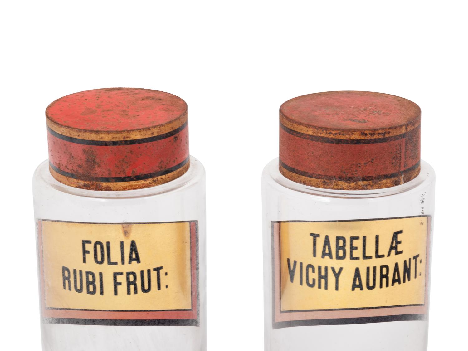A Pair of Clear Glass Apothecary Jars