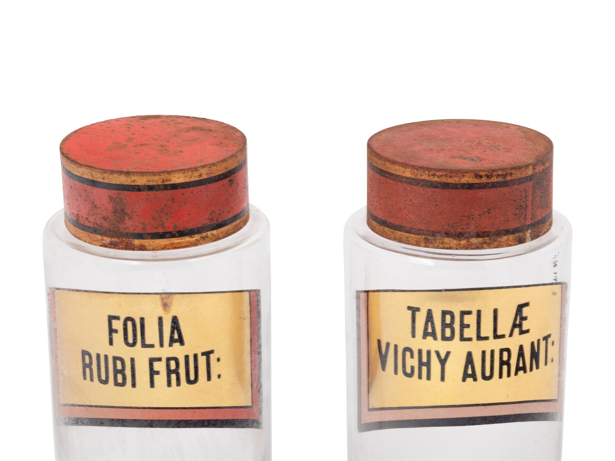 A Pair of Clear Glass Apothecary Jars