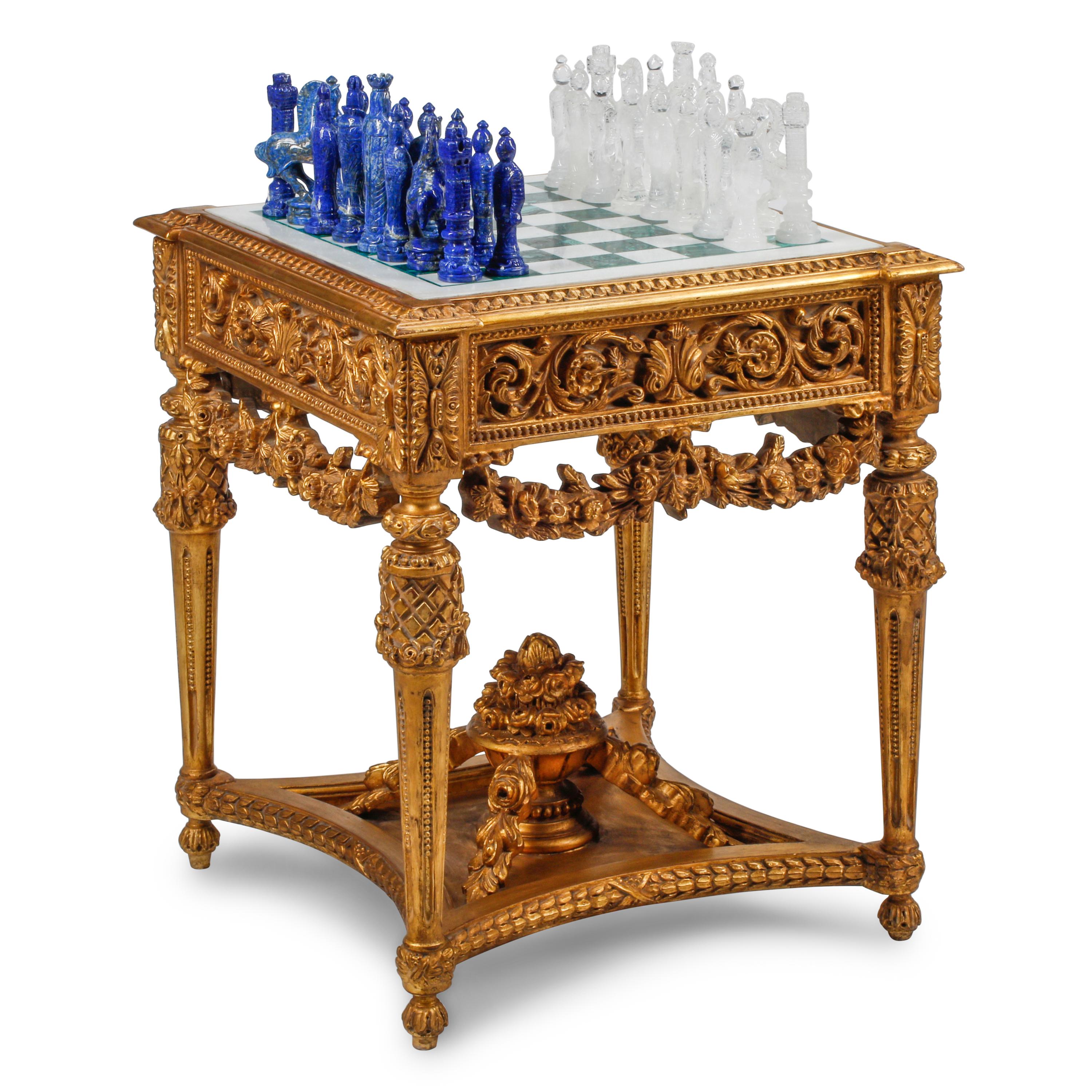 A Louis XVI Style Giltwood, Marble and Malachite Game Table with a Carved Rock Crystal and Lapis Lazuli Chess Set