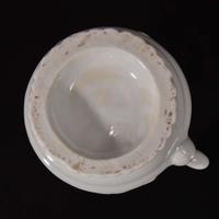 A small Chinese white glazed porcelain ewer Ming dynasty or earlier