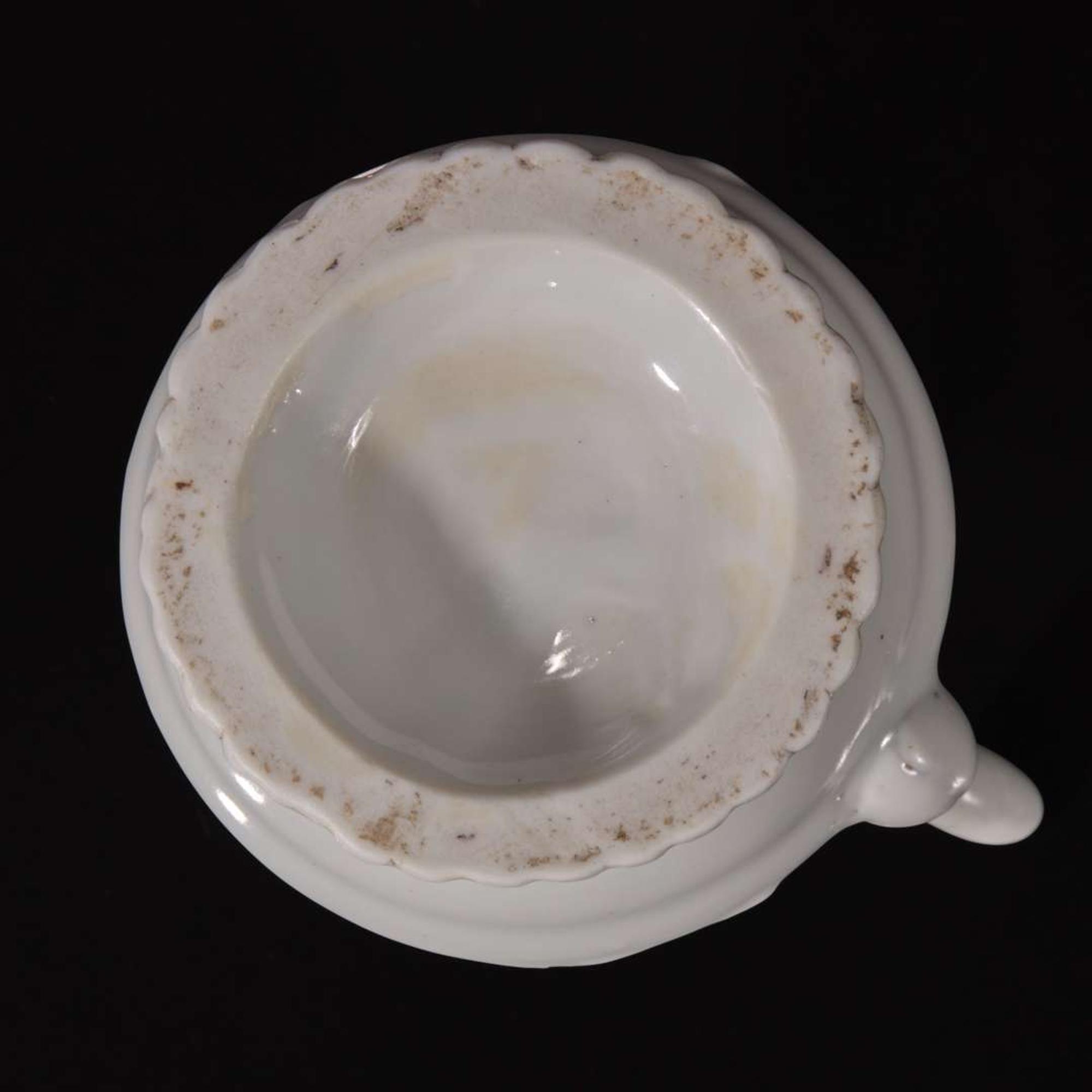 A small Chinese white glazed porcelain ewer Ming dynasty or earlier
