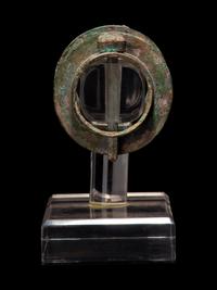 A Pair of Chinese Archaic Bronze Axle Covers and Linchpins