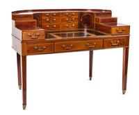 A George III Gilt-Tooled Leather-Inset, Inlaid Mahogany and Satinwood-Banded Carlton House Desk Height 41 x width 53 1/2 x depth 33 inc
