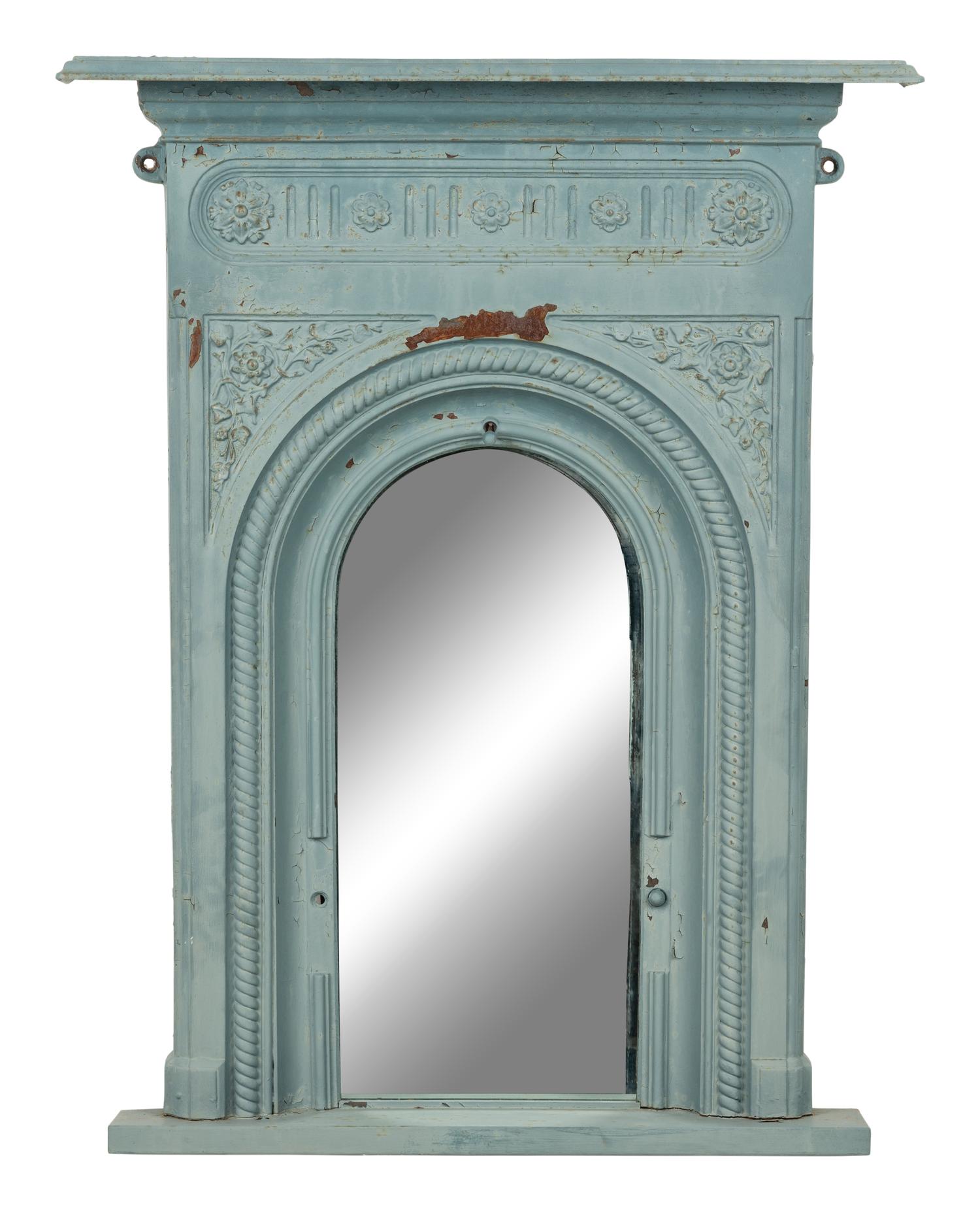 A Patinated Cast Iron Mirror