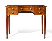 A George III inlaid mahogany, satinwood, and kingwood writing table, circa 1810