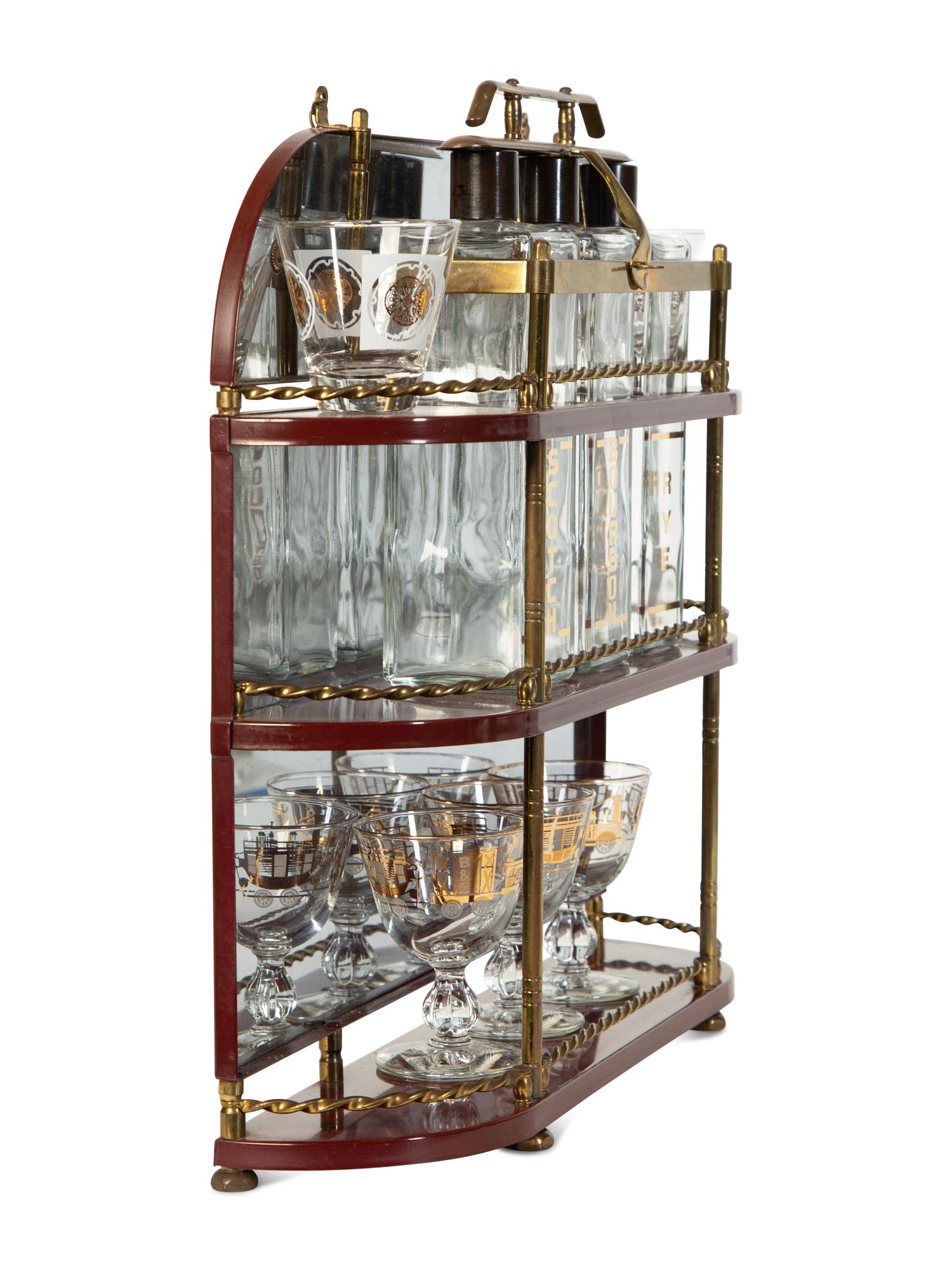 A Brass-Mounted Liquor Rack with Glasses and Tantalus