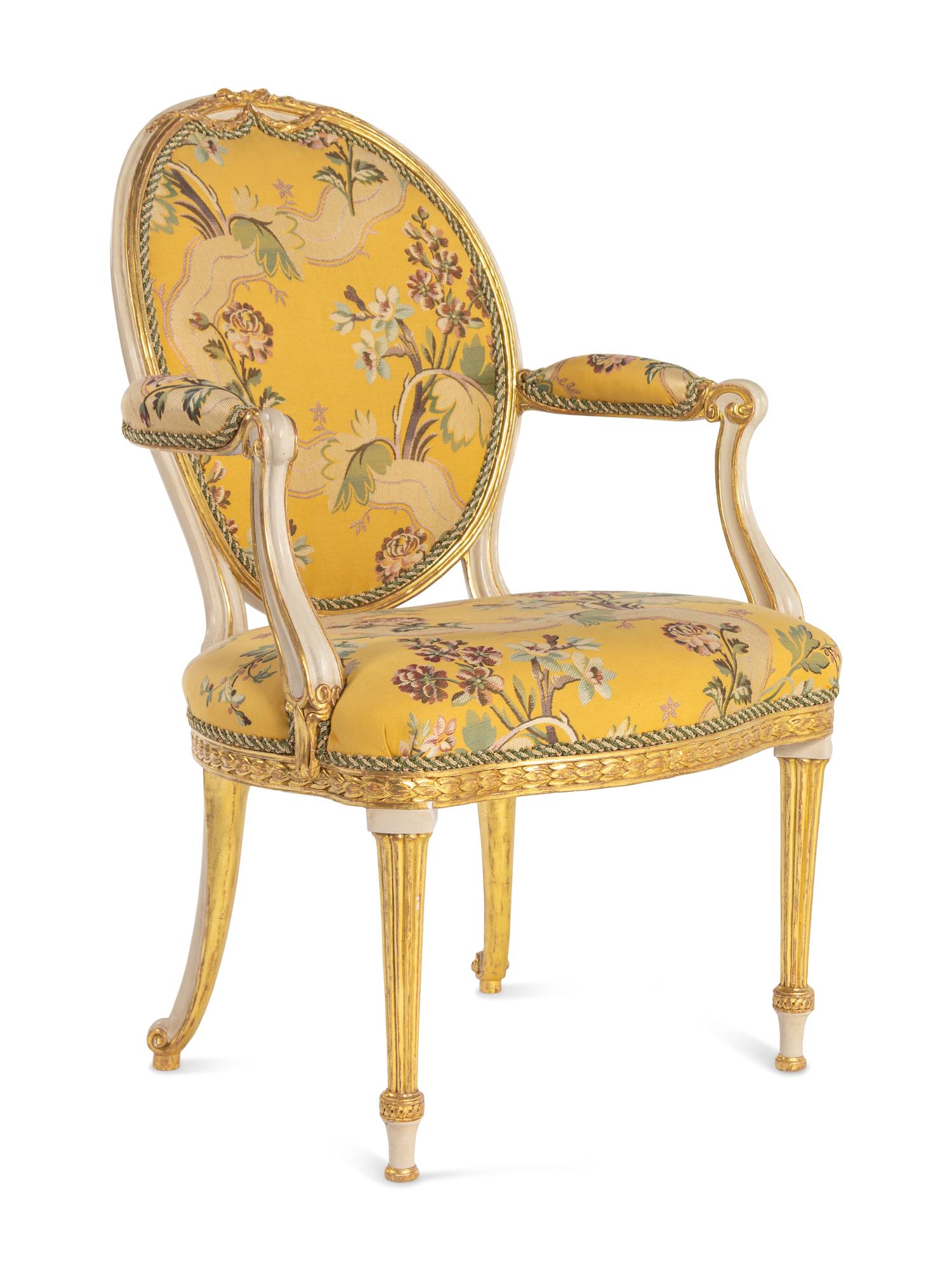 A George III White-Painted and Parcel-Gilt Open Armchair