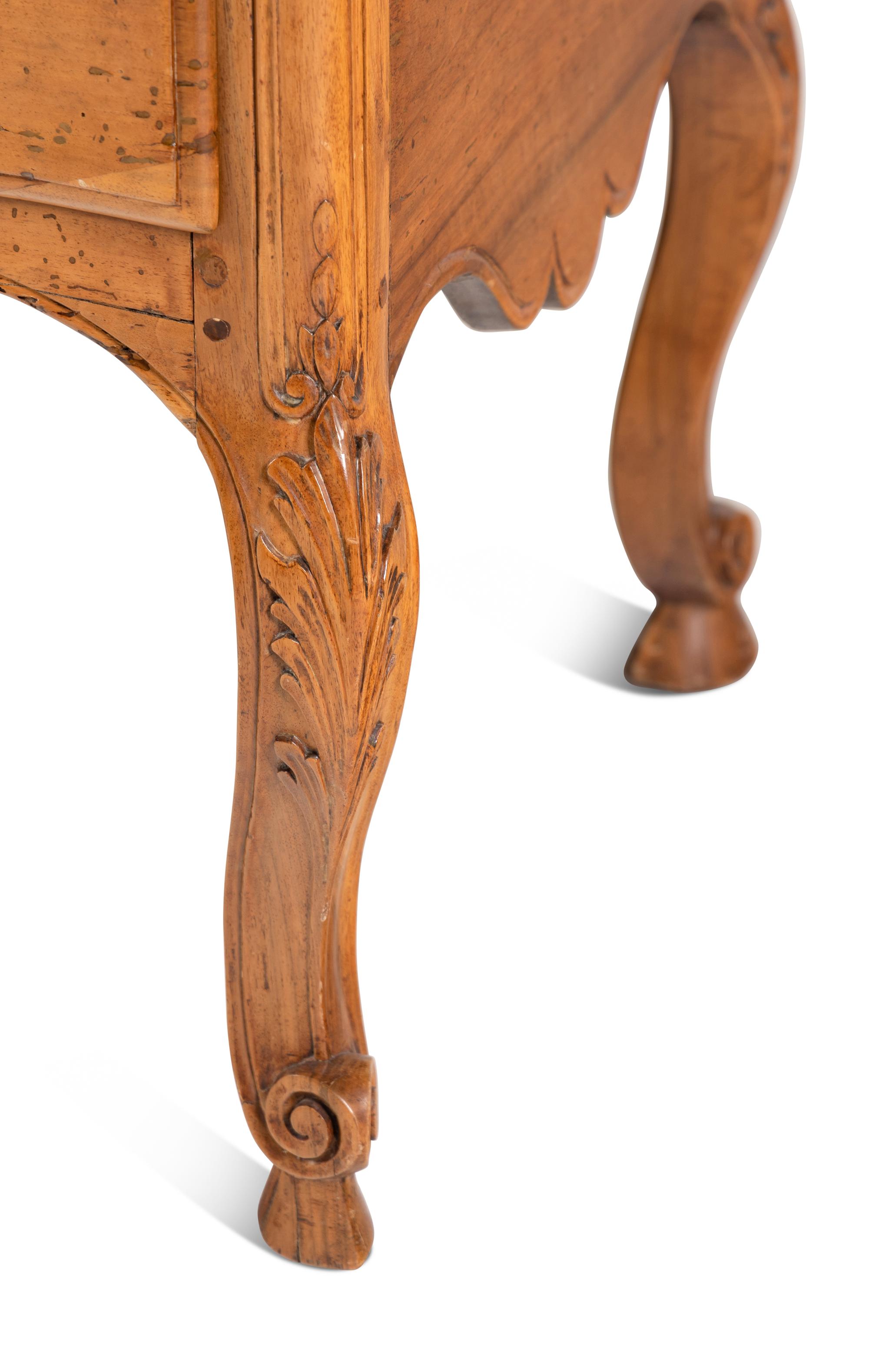 A Louis XV Fruitwood Commode