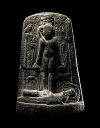 An Egyptian Black Stone Cippus of Horus