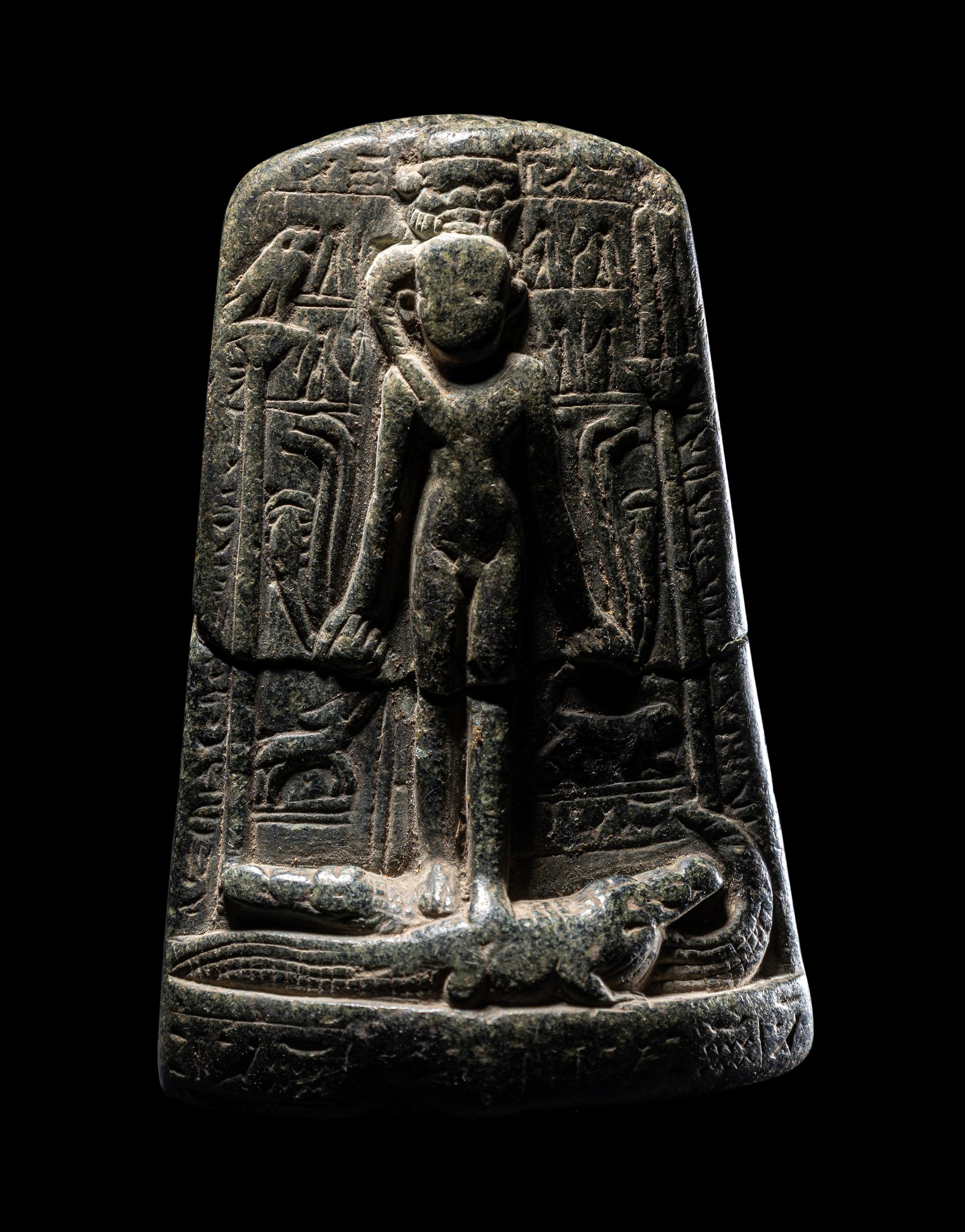 An Egyptian Black Stone Cippus of Horus