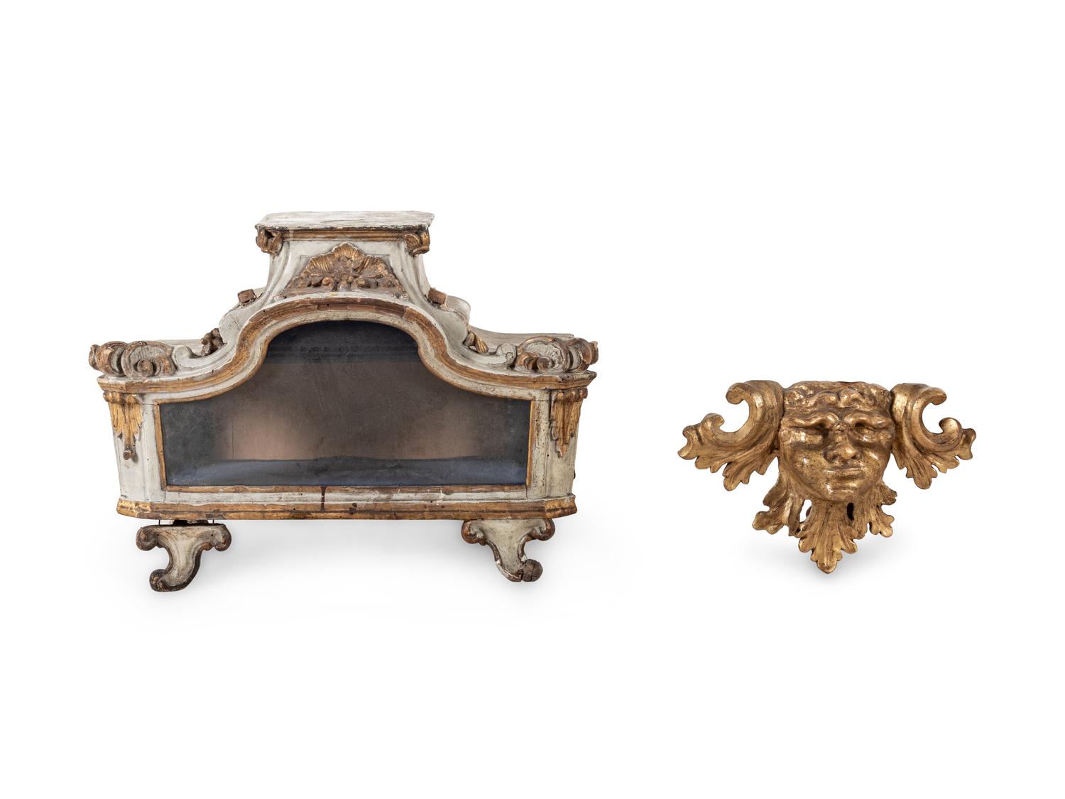 An Italian Painted and Parcel Gilt Reliquary and a Giltwood Mask Ornament