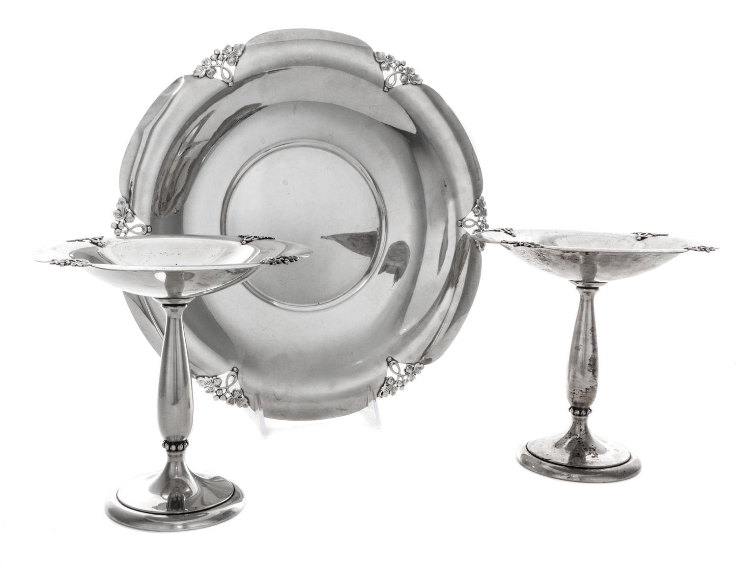 An American Silver Garniture, M. Fred Hirsch Co., Jersey City, NJ, Alexandria pattern, comprising a pair of compotes and a tray.