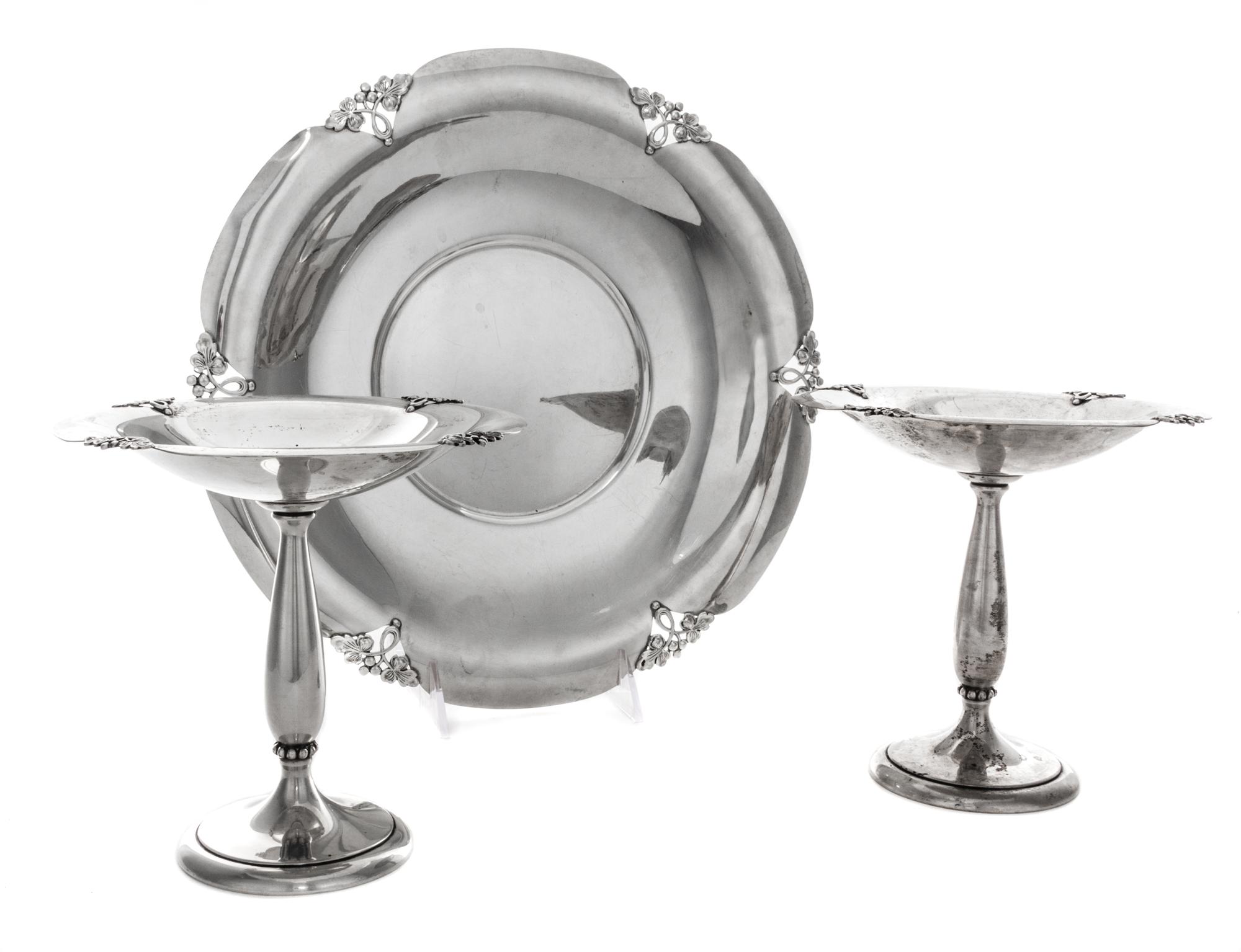 An American Silver Garniture, M. Fred Hirsch Co., Jersey City, NJ, Alexandria pattern, comprising a pair of compotes and a tray.