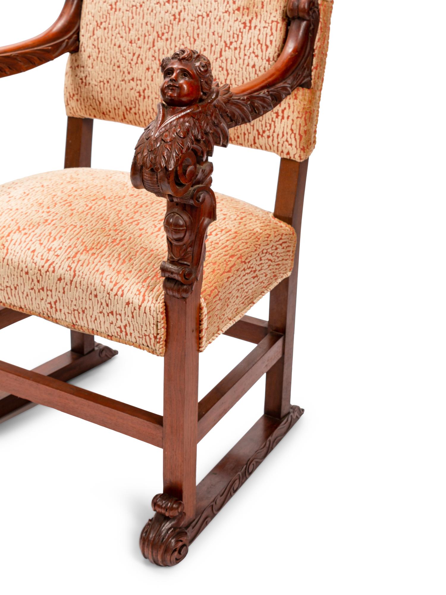 A Pair of Renaissance Style Carved Walnut Armchairs