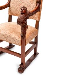 A Pair of Renaissance Style Carved Walnut Armchairs