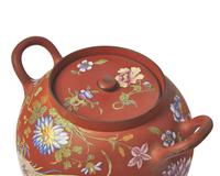 A Wedgwood Polychrome Enameled Rosso Antico Potpourri Jar and Cover