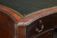 A George III Carved Mahogany Partners Desk