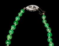 A Jadeite Bead and Diamond Necklace