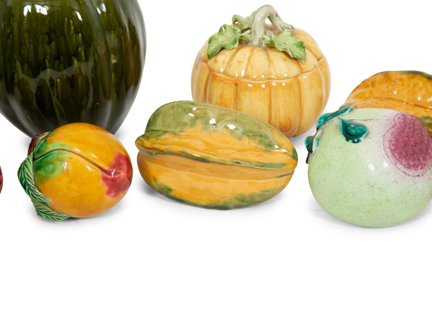 A Collection of Fifteen Miscellaneous Glazed Ceramic Fruits and Vegetables