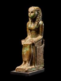 An Egyptian Faience Enthroned Queen or Goddess