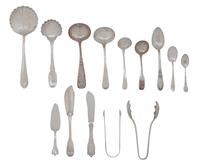 A Group of American and English Silver Serving Pieces, , comprising; 3 shell form serving spoons, 4 sauce ladles, 2 sugar tongs, 2 butt