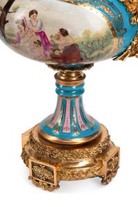 A Pair of Gilt Bronze Mounted Sèvres Style Porcelain Vases and Covers