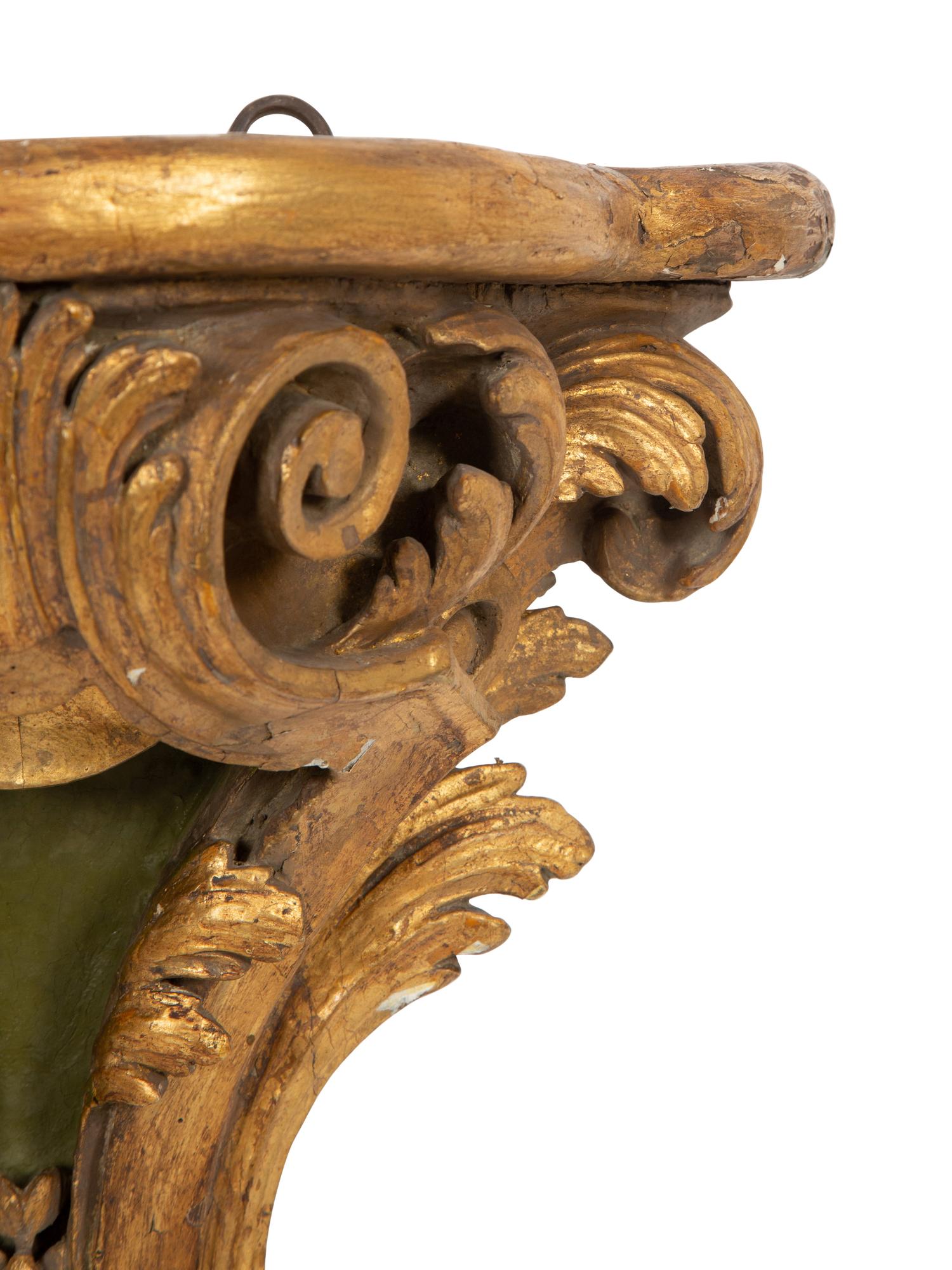 A Pair of Continental Parcel Gilt and Green-Painted Large Wall Brackets