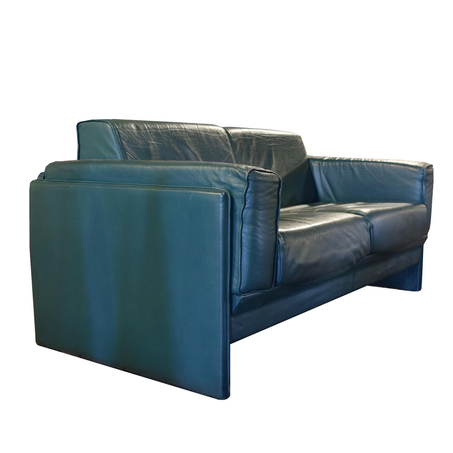 A Pair of Mid-Century Leather Sofas, from the Milan Airport 61" W x 35" D x 30" H — Italy, Mid-20th Century