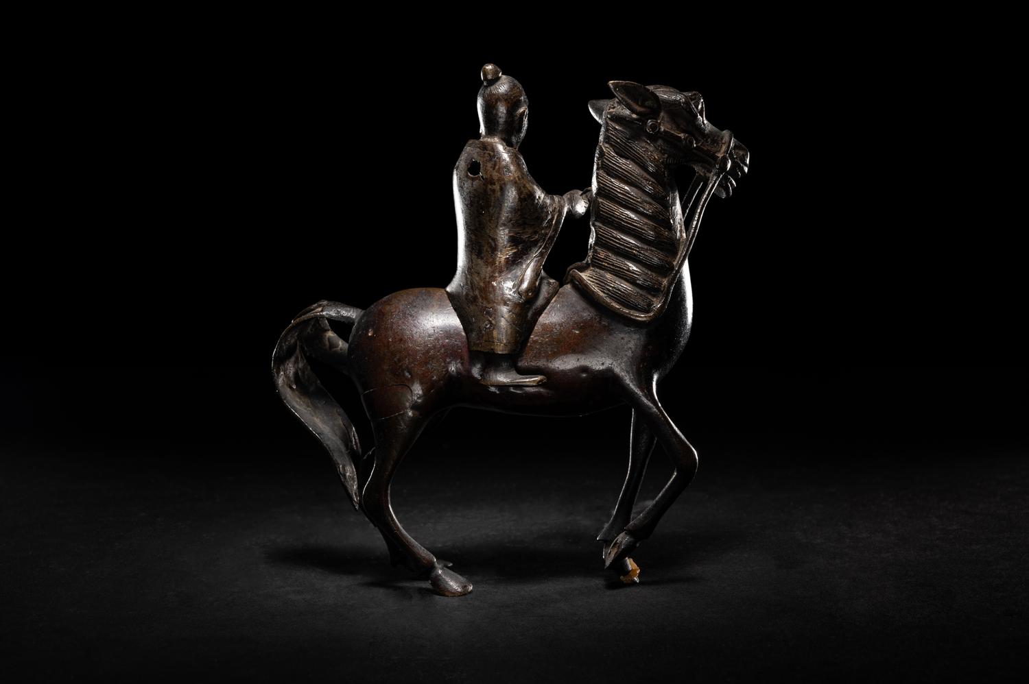 A Chinese Bronze Figural Form Incense Burner
