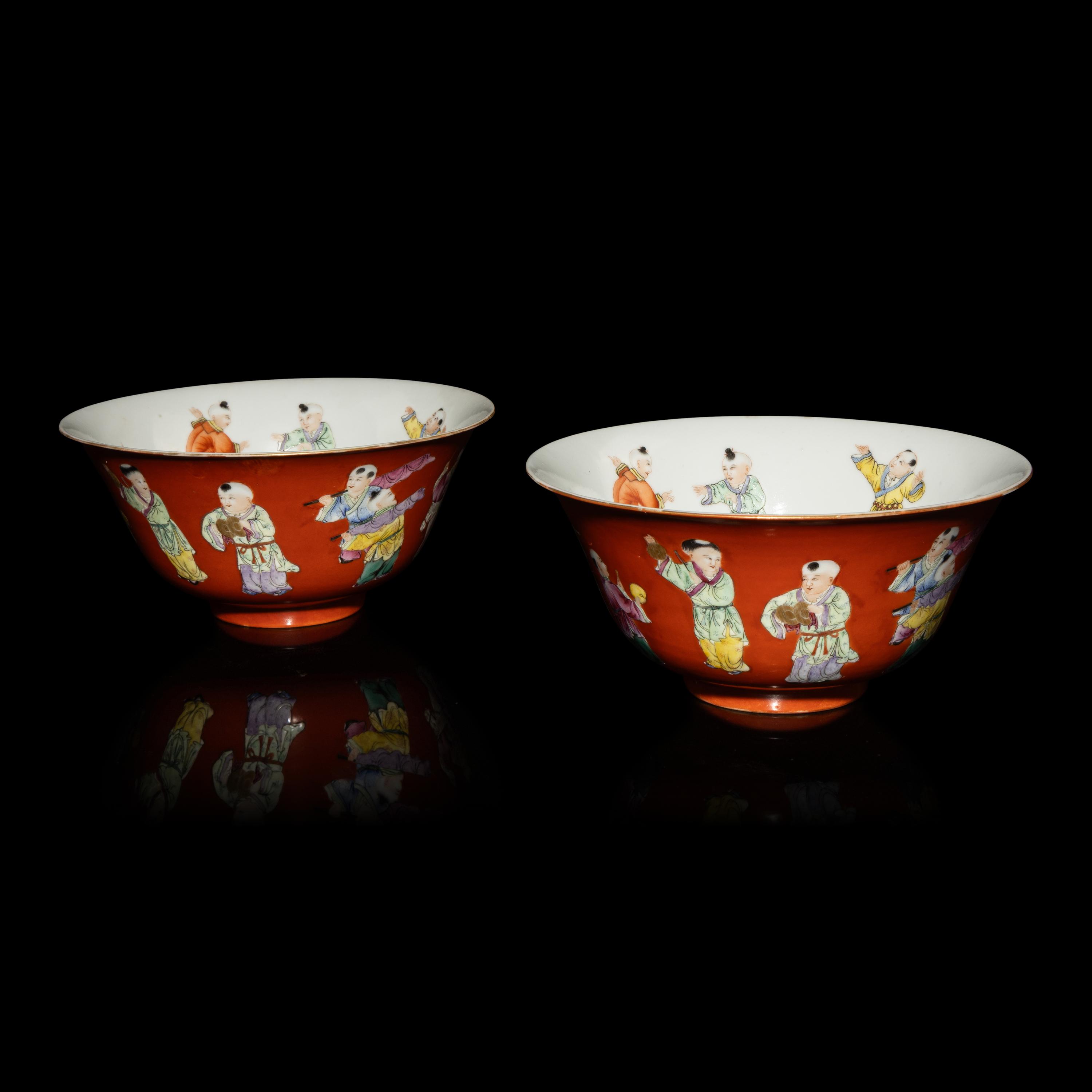 A Pair of Chinese Coral-Red Ground Famille Rose Porcelain Bowls, Late 19th-20th Century — 清晚期 珊瑚紅地粉彩童子圖碗一對