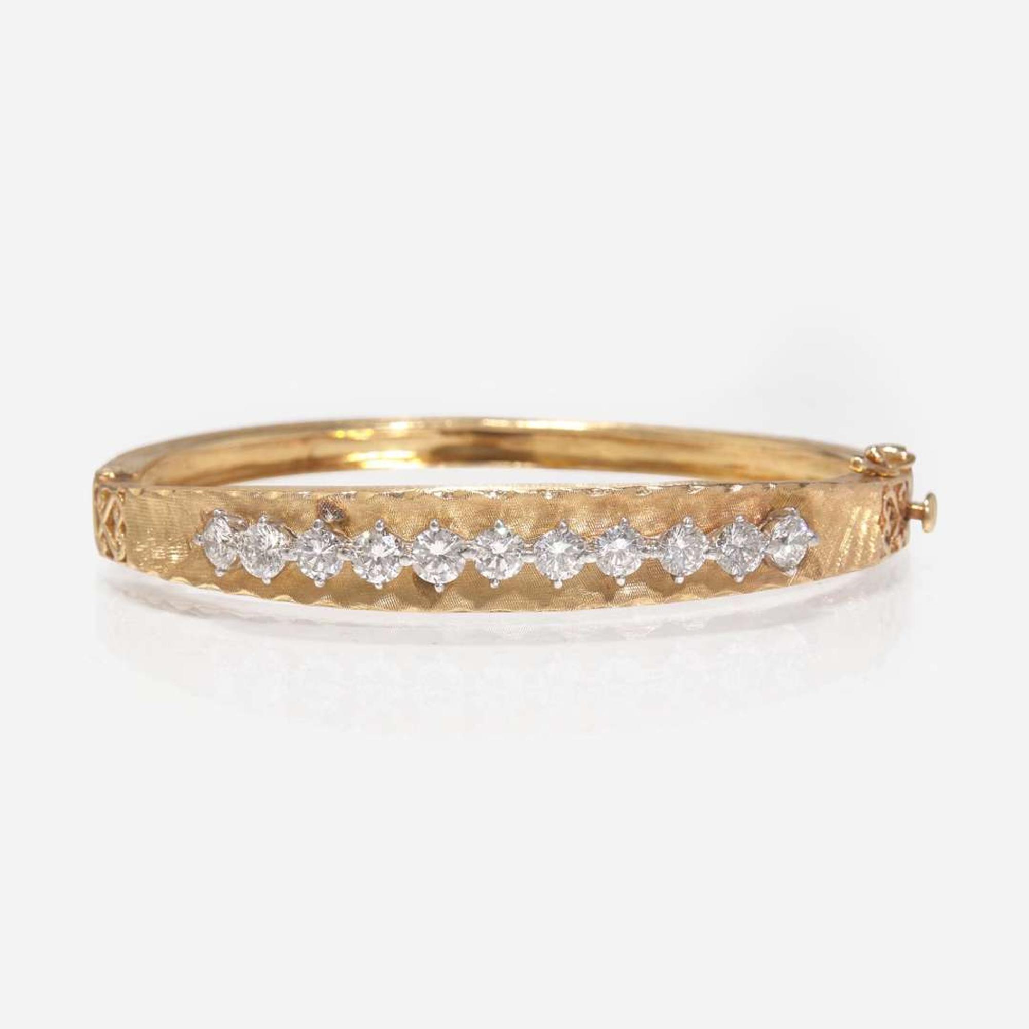 A 14K Gold and Diamond Bangle Bracelet