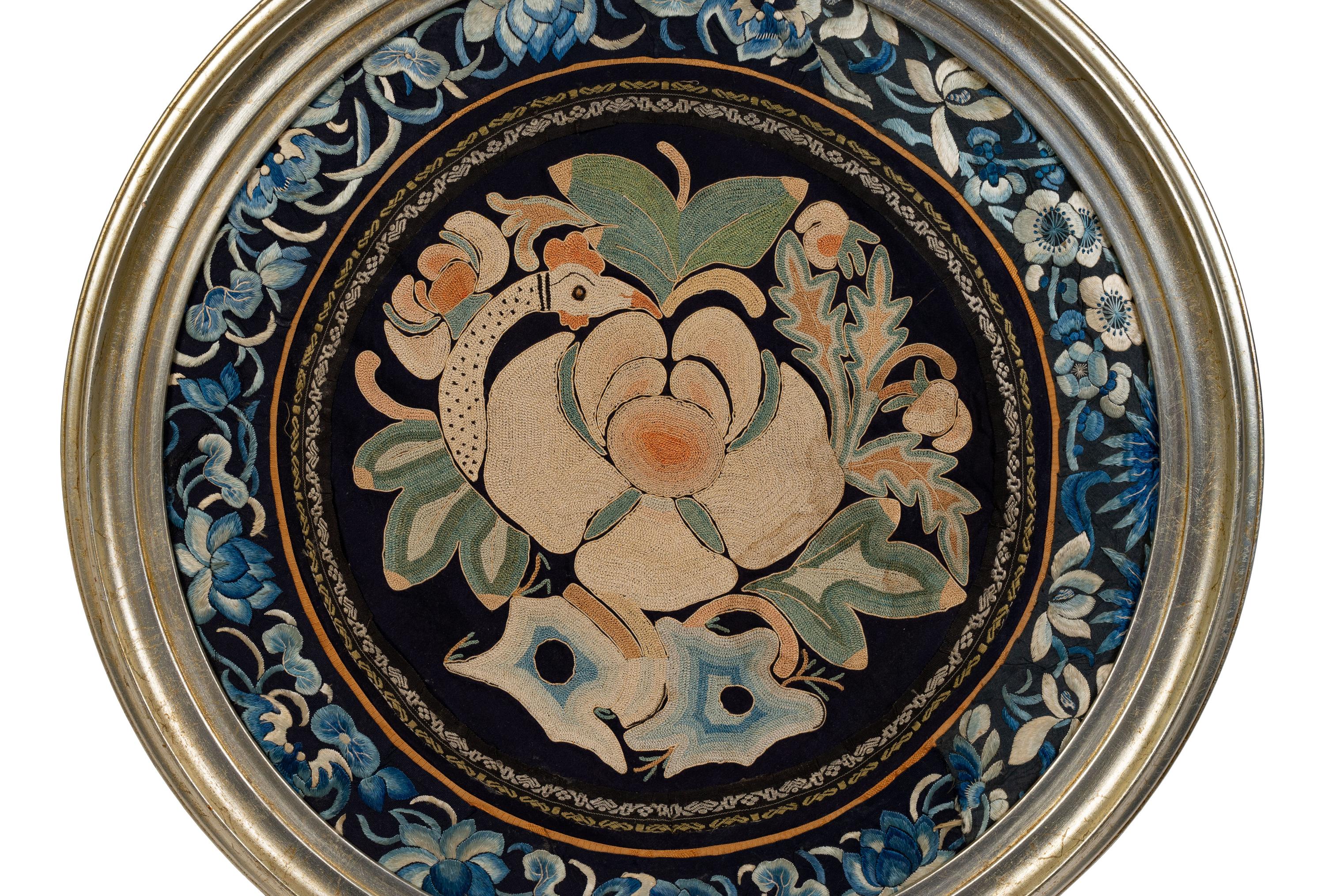 A Chinese Framed Blue Ground Embroidered Silk Panel Diameter 13 1/2 inches.