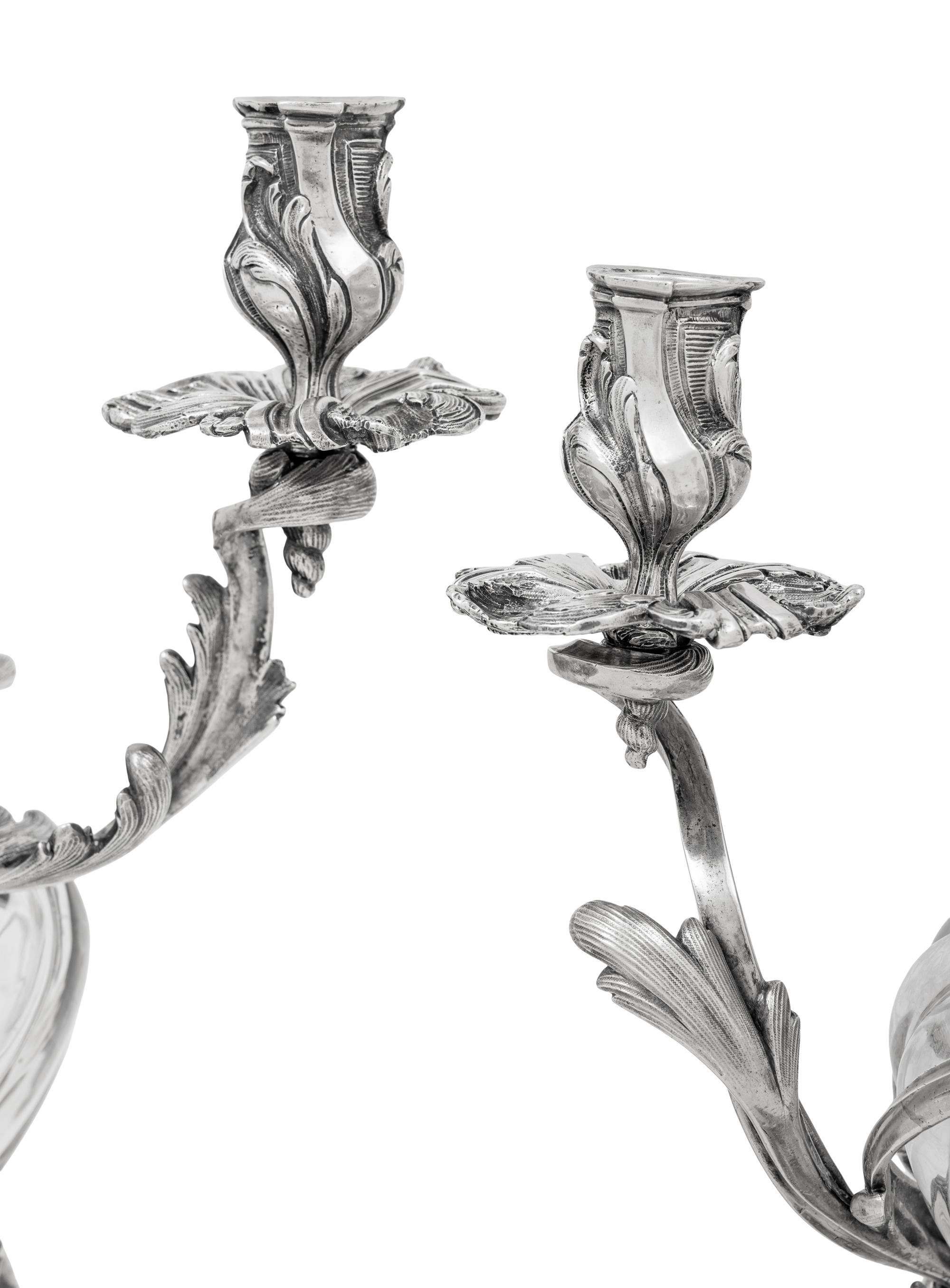 A Pair of Austrian Silver Mounted Cut Glass Three-Light Candelabra